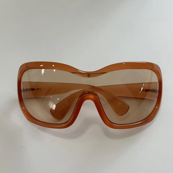 Take A Look About Prada Illusion Sunglasses